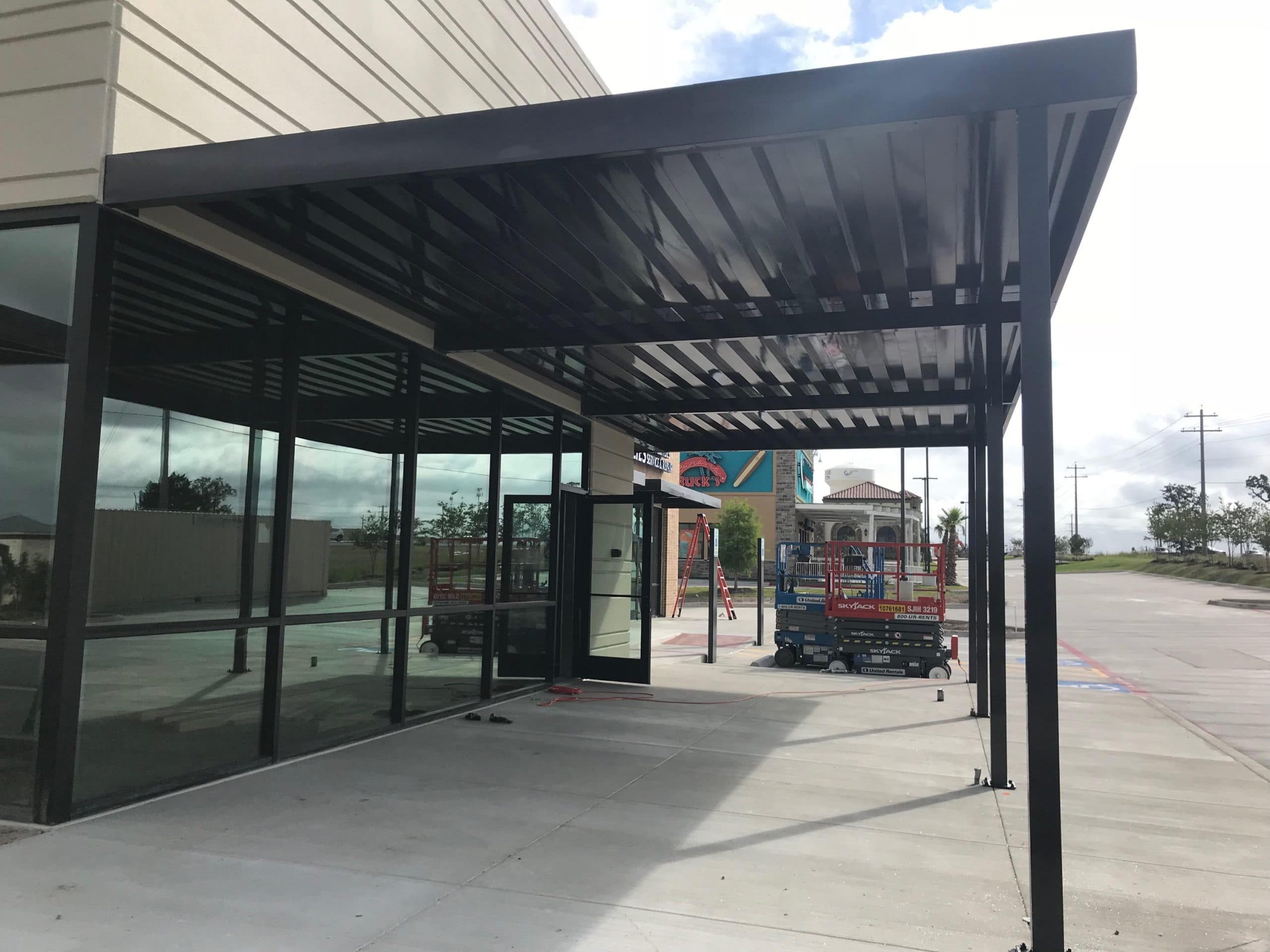 Custom extruded aluminum awnings, walkway covers & canopies installation 8 by AAA Awning Co., Houston Texas