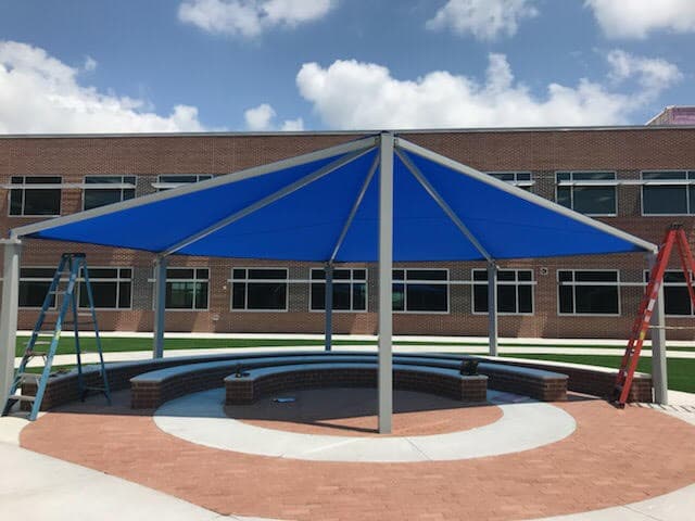 Custom shade structures — Engineered shade systems for schools, parks, pools, and commercial properties. Fabricated and installed by AAA Awning Co., Houston Texas.